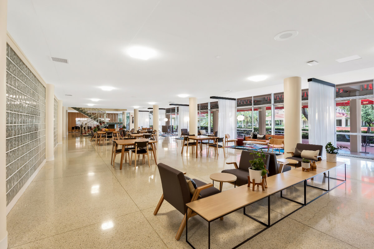 Cafeteria with upgraded column design with refinished columns using Belbien architectural film